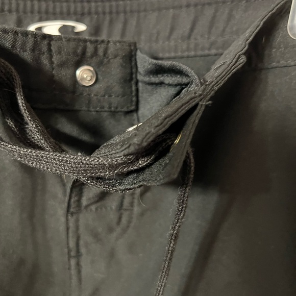 O’Neill swim short. Black. Waist approximate 16”. Cute cut out pattern each leg - Picture 5 of 6